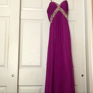 La Femme magenta and rhinestone gown